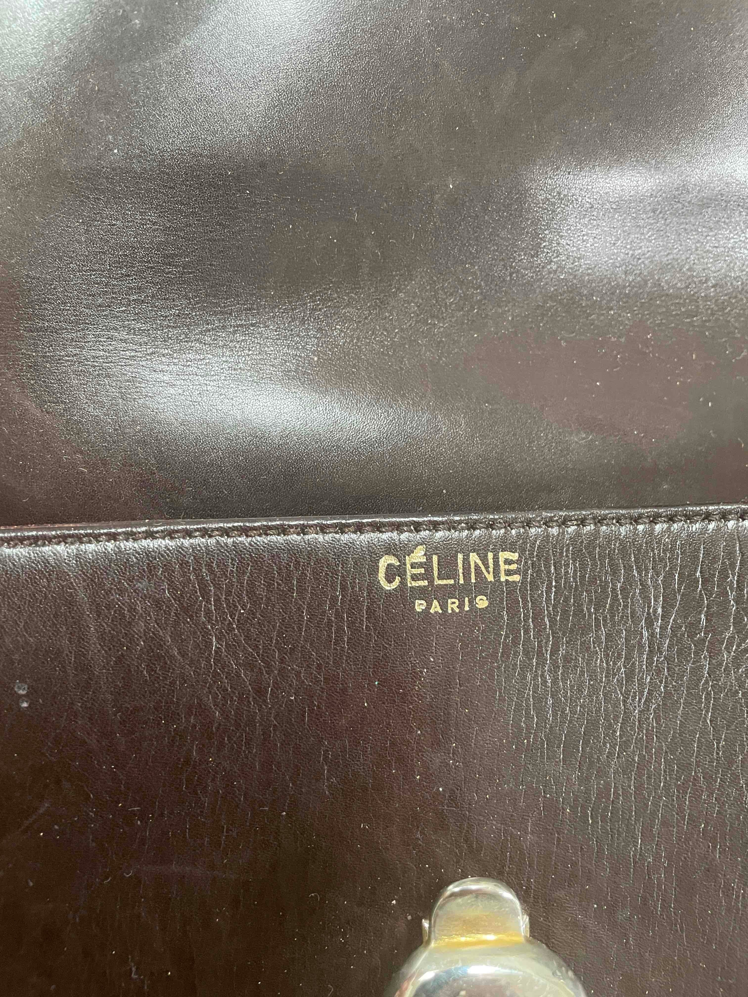CÉLINE Paris Black canvas clutch bag with brown leather… | Drouot.com