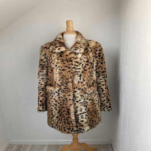 Manteau best sale leopard fourrure